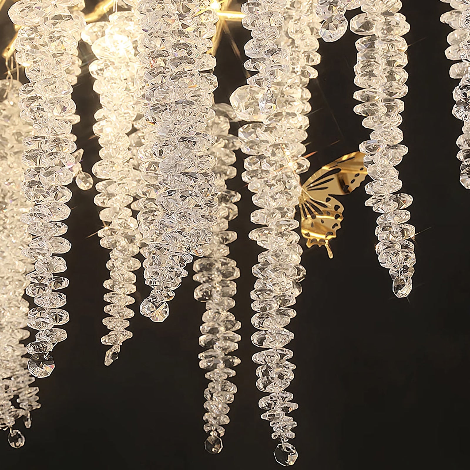Elegant crystal wicker chandelier by Korewolamp with intricate glass detailing and warm lighting design.