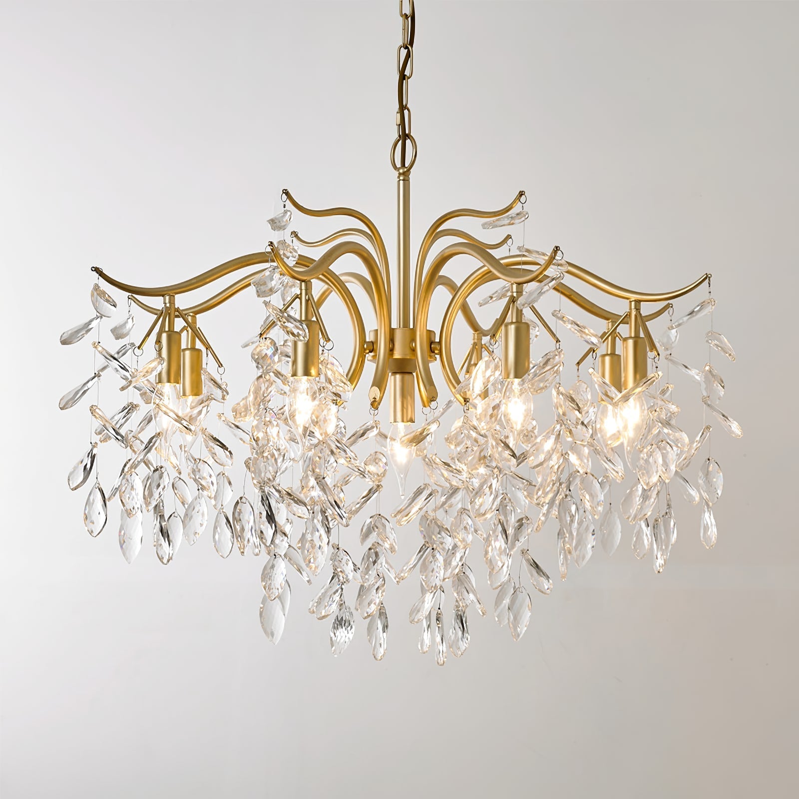 Dorale chandelier by Korewolamp featuring intricate metalwork and multiple hanging glass orbs for elegant interior lighting.