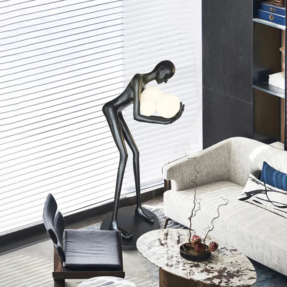 Figure Holding Ball Sculpture Floor Lamp - Nuvé