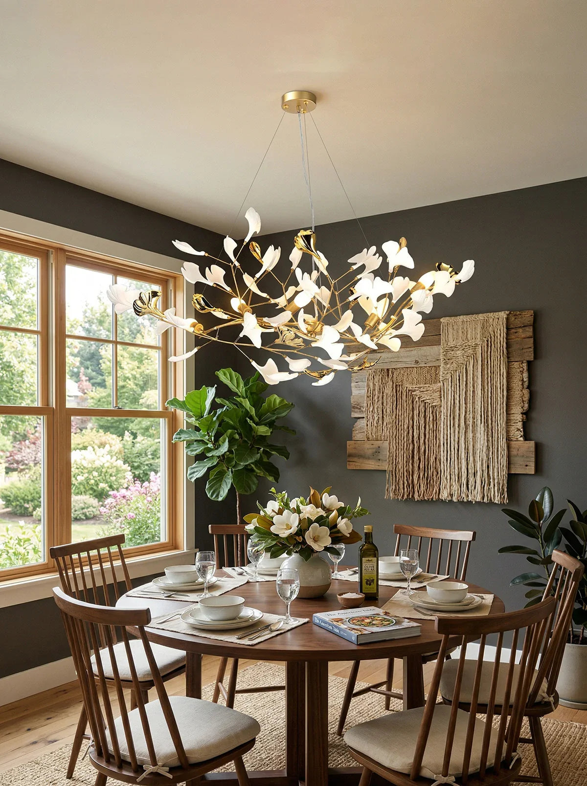 Gingko Ceramic Chandelier S by Korewolamp featuring a sleek, modern design with ceramic leaf-shaped elements and warm lighting.