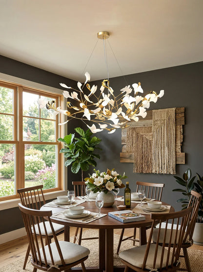 Gingko Ceramic Chandelier S by Korewolamp featuring a sleek, modern design with ceramic leaf-shaped elements and warm lighting.