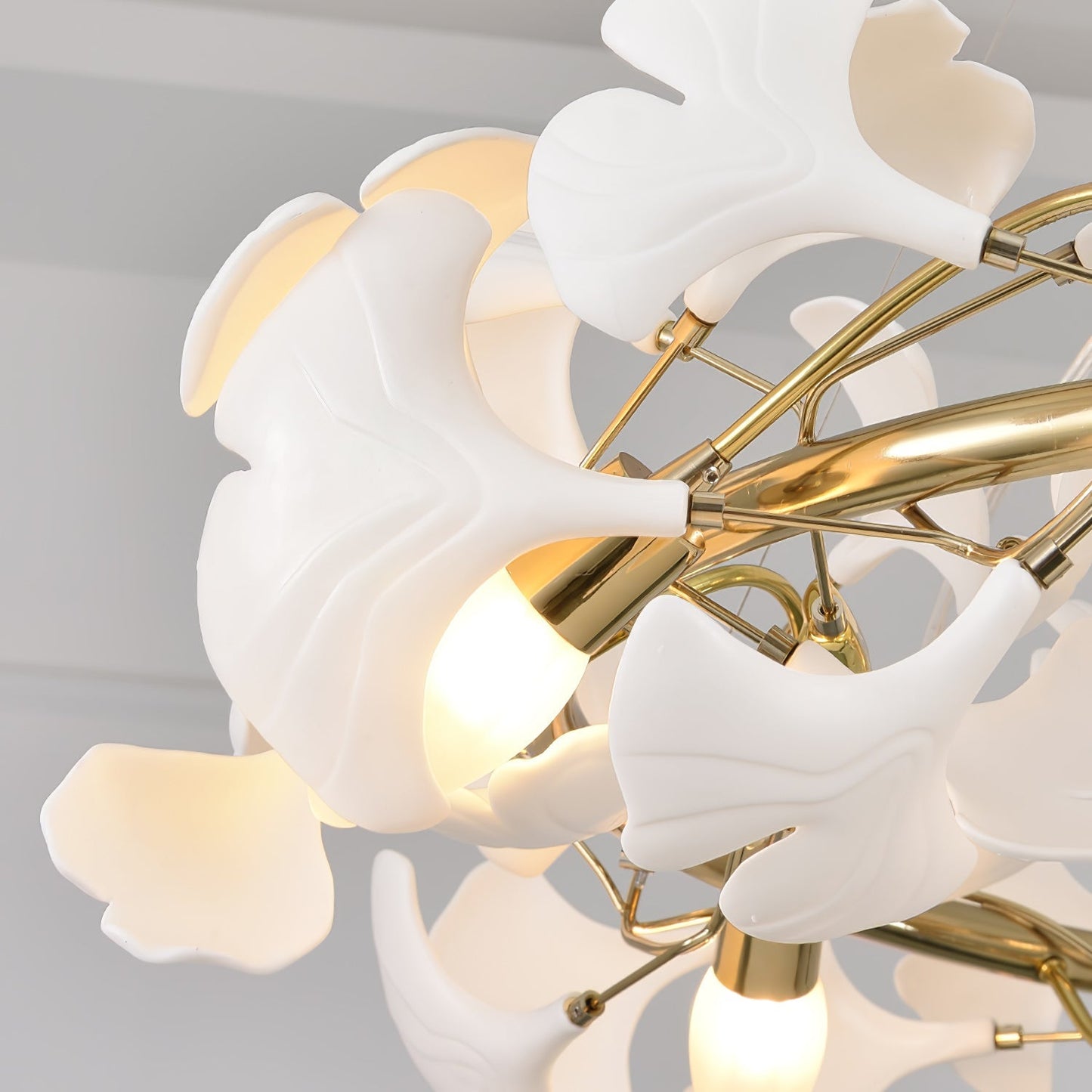 Korewolamp Gingko Ceramic Chandelier K featuring a modern, artistic ceramic design with hanging light bulbs and intricate leaf-shaped details.