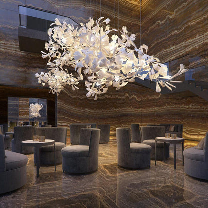 Korewolamp Gingko Ceramic Chandelier with multiple ginkgo leaf-shaped light fixtures hanging from a sleek frame.