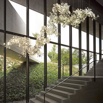 Korewolamp Gingko Ceramic Chandelier with leaf-shaped design and warm lighting, hanging fixture for modern interior decor.