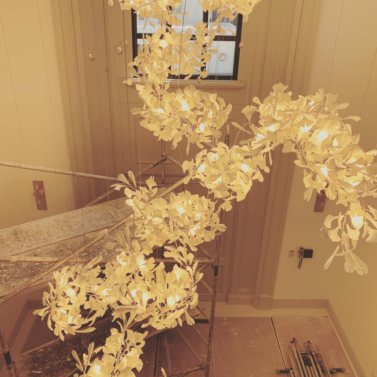 Gingko Ceramic Chandelier by Korewolamp featuring a modern ceramic design with leaf-inspired branches and warm lighting.