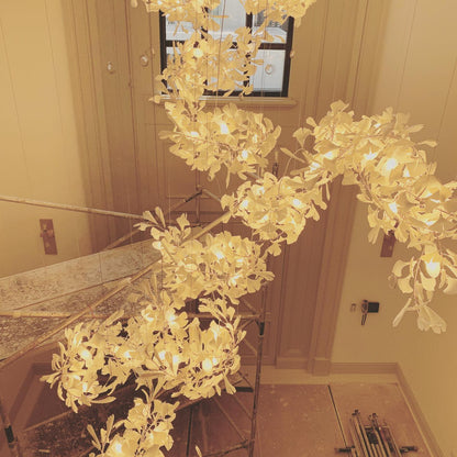 Gingko Ceramic Chandelier by Korewolamp featuring a modern ceramic design with leaf-inspired branches and warm lighting.