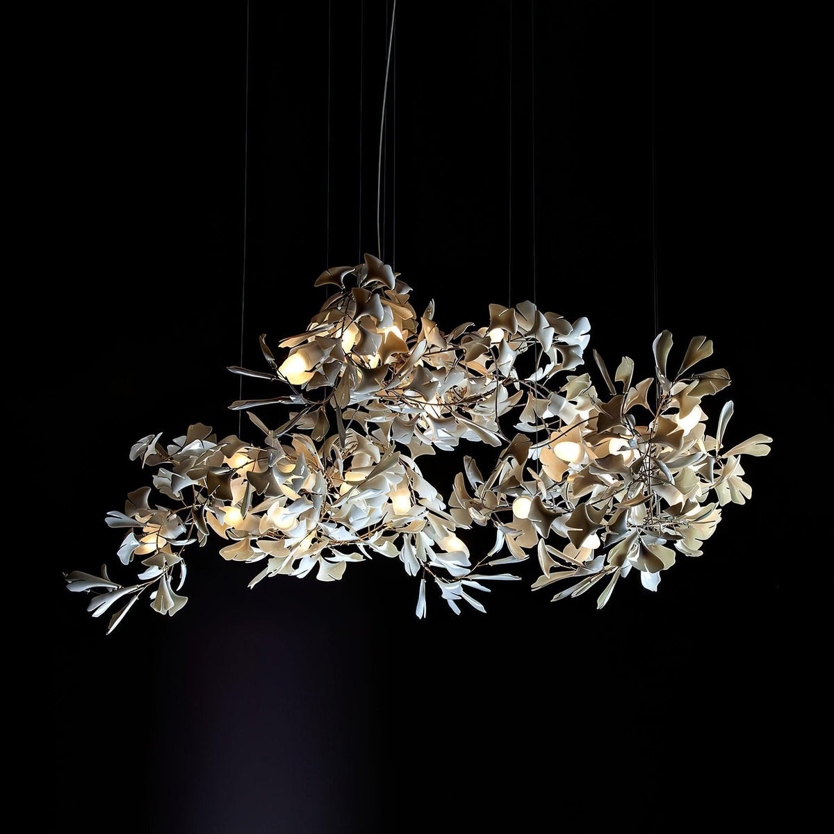 Korewolamp Gingko Ceramic Chandelier with ginkgo leaf design, featuring multiple ceramic light fixtures hanging from a central frame.