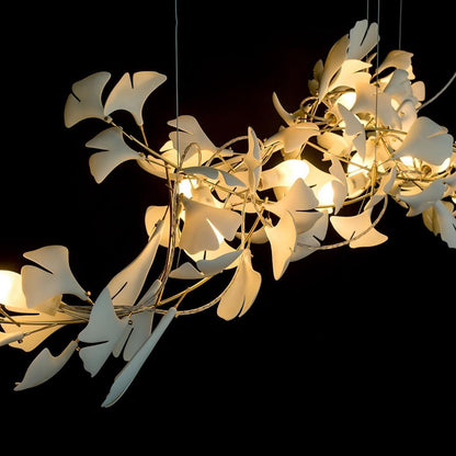 Gingko Ceramic Chandelier by Korewolamp featuring a modern ginkgo leaf design with hanging ceramic leaves and warm lighting.