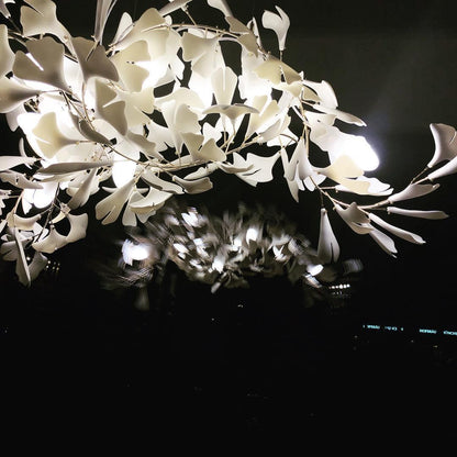 Korewolamp Gingko Ceramic Chandelier with leaf-shaped design, hanging from a ceiling with soft lighting and modern aesthetic.