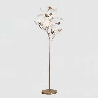 Korewolamp Gingko floor lamp with a sleek, modern design and a tall, slender stand featuring a ginkgo leaf-shaped lampshade.
