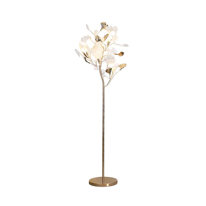 Korewolamp Gingko floor lamp with a sleek, modern design featuring a curved stand and a large, leaf-shaped lampshade.