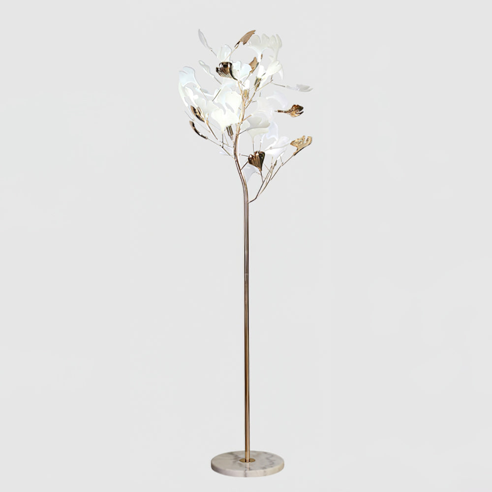 Korewolamp Gingko floor lamp with a sleek, modern design and a white lampshade standing on a wooden base in a stylish living room setting.