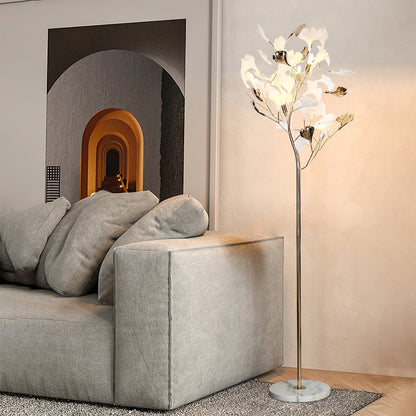 Korewolamp Gingko floor lamp with a modern design, featuring a curved metal stand and a white fabric lampshade.