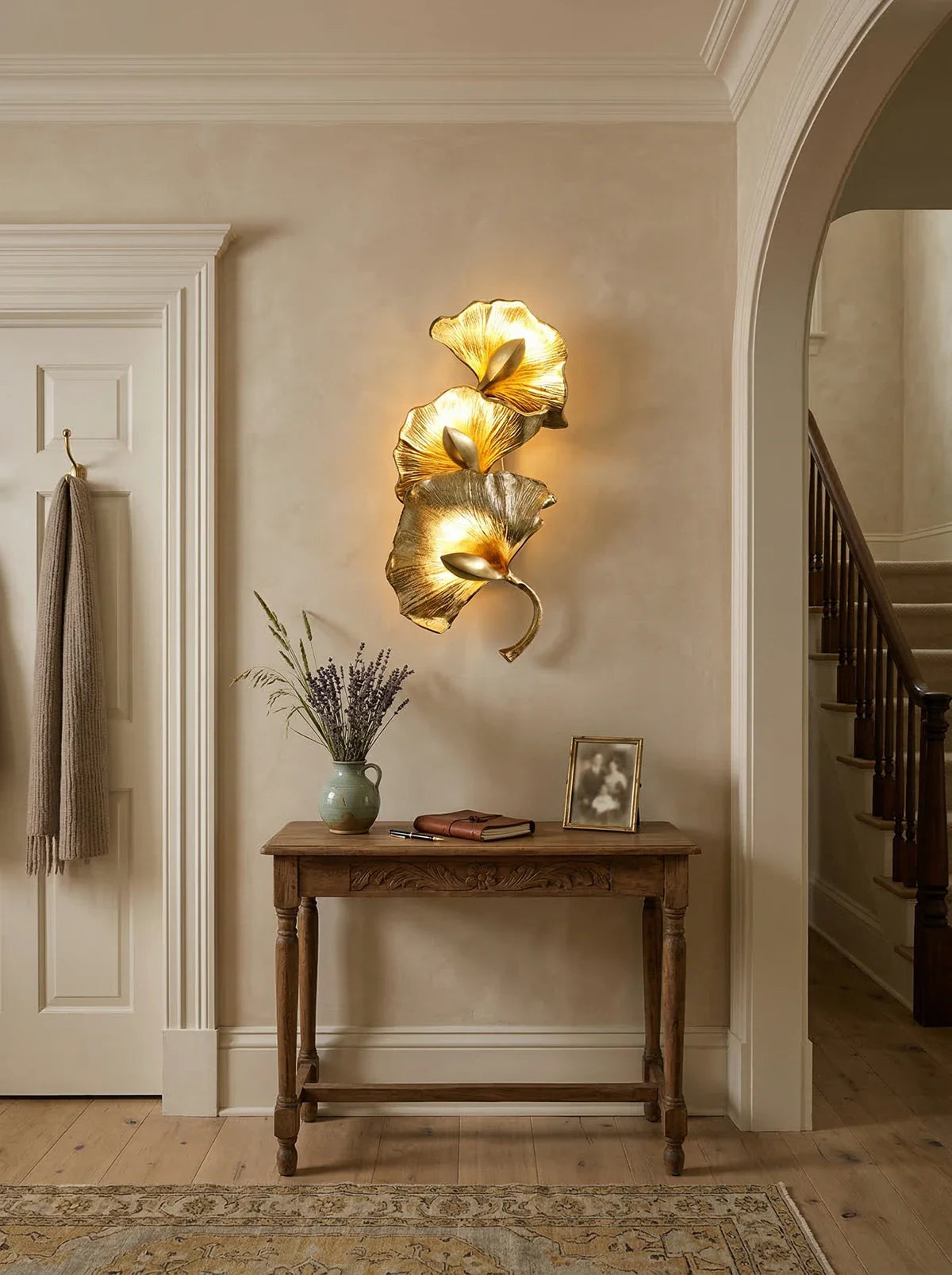 Ginkgo leaf wall lamp by korewolamp featuring a decorative leaf-shaped design illuminated on a wall.