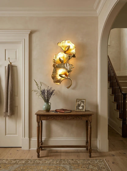 Ginkgo leaf wall lamp by korewolamp featuring a decorative leaf-shaped design illuminated on a wall.