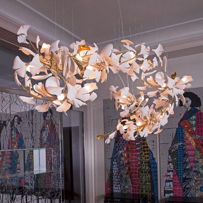 Gingko Ceramic Chandelier by Korewolamp featuring leaf-shaped design and warm lighting, hanging from a ceiling.