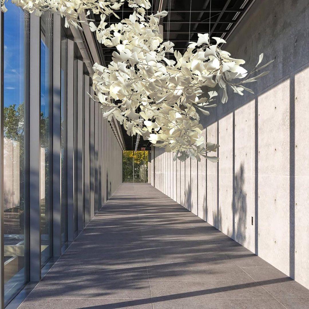 Korewolamp Gingko Ceramic Chandelier with leaf-shaped design, hanging fixture with intricate leaf pattern and warm ceramic finish.