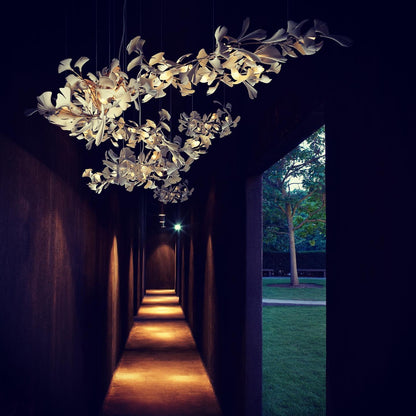 Gingko Ceramic Chandelier by Korewolamp featuring leaf-shaped ceramic design hanging in a modern interior.