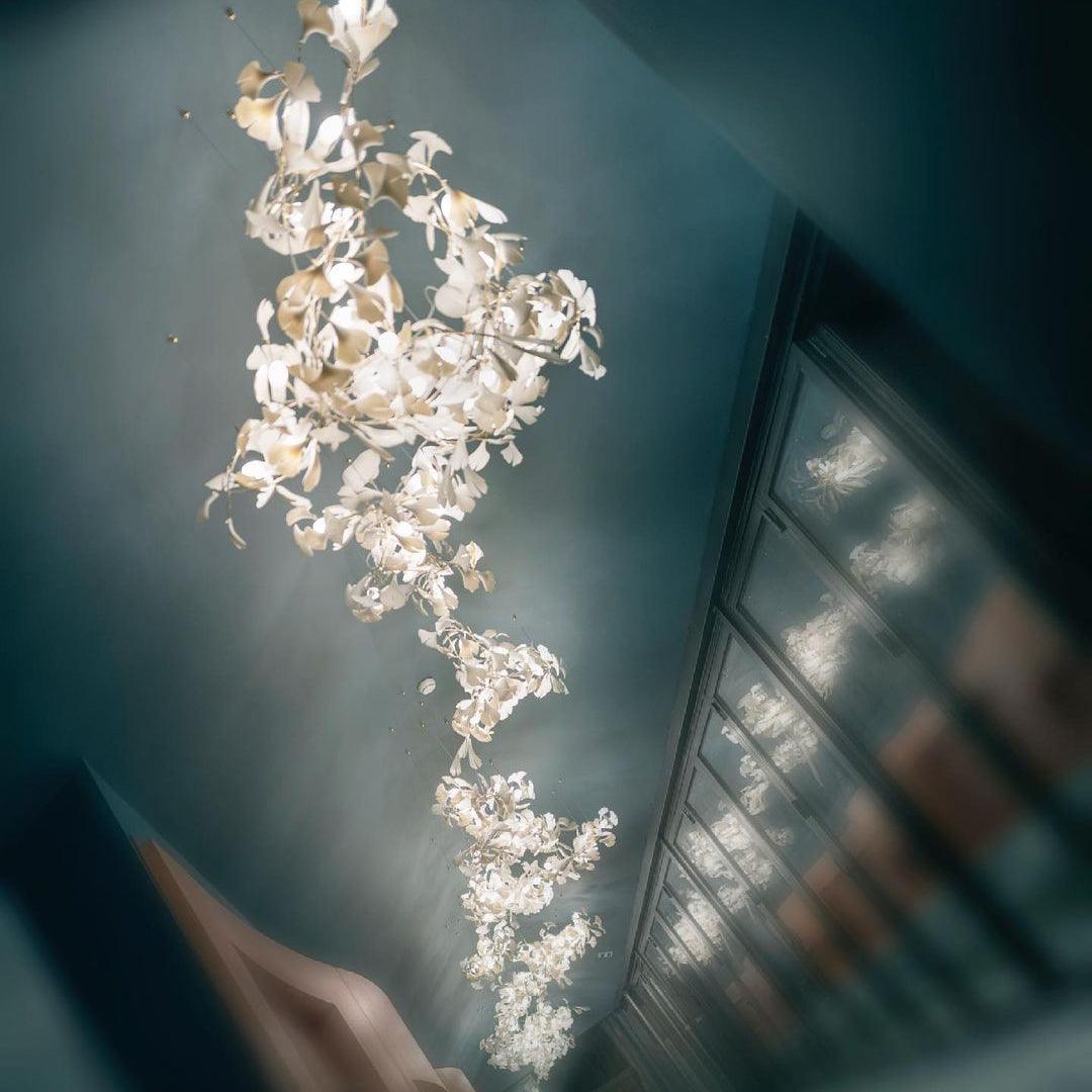 Ginkgo leaf ceramic chandelier by Korewolamp featuring intricate ginkgo leaf design in white ceramic.