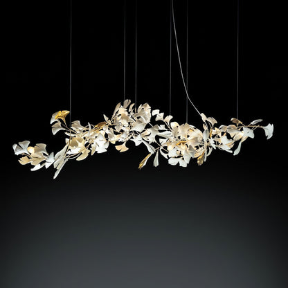 Gingko ceramic chandelier by Korewolamp featuring leaf-shaped design with white ceramic leaves hanging from a metal frame.