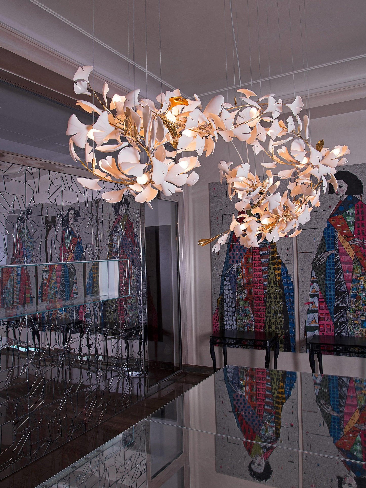 Ginkgo ceramic chandelier by Korewolamp featuring leaf-shaped design and warm ceramic finish, hanging with decorative bulbs.