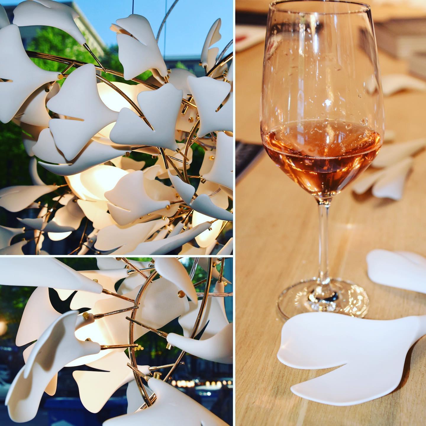 Korewolamp Gingko Ceramic Chandelier with leaf-shaped design hanging from ceiling in modern interior.