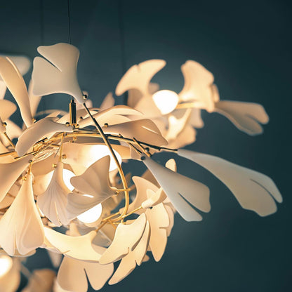Gingko Ceramic Chandelier by Korewolamp featuring leaf-shaped ceramic design and warm ambient lighting.