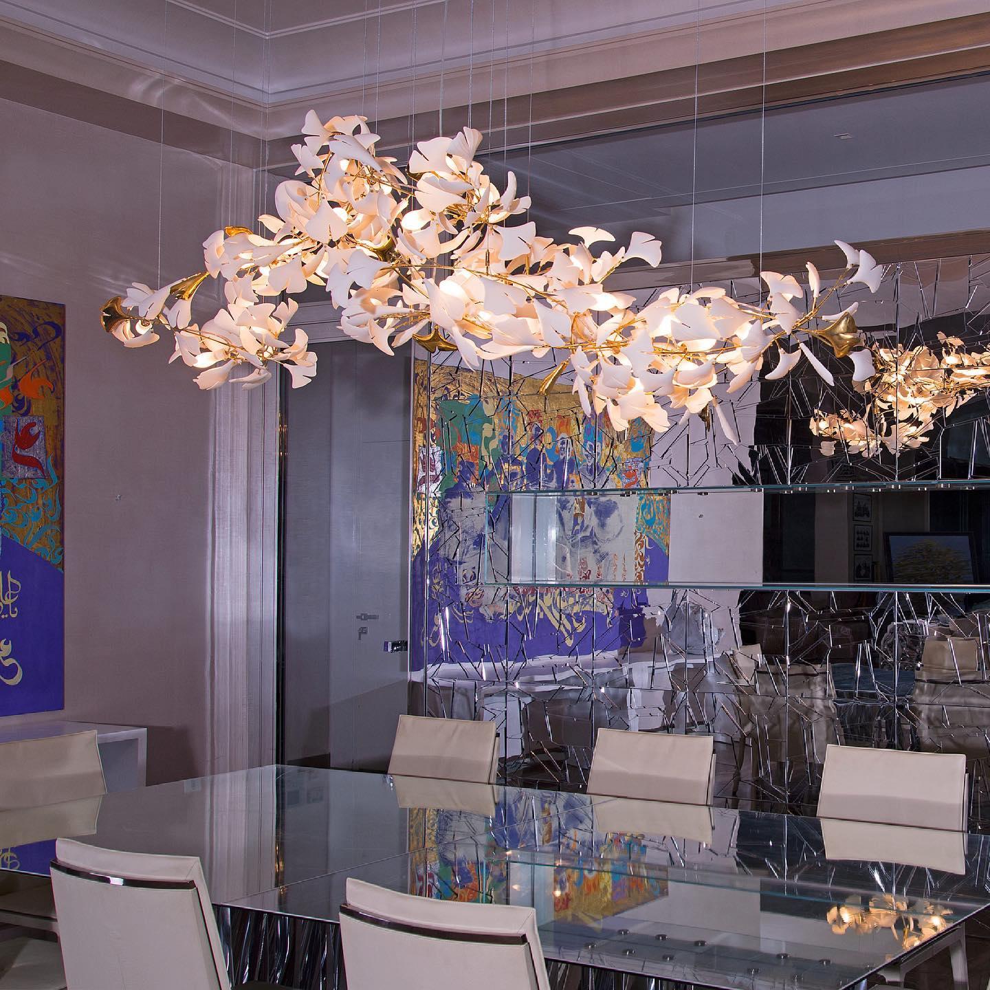 Gingko Ceramic Chandelier by Korewolamp featuring a leaf-shaped design with six ceramic ginkgo leaf-shaped lights.