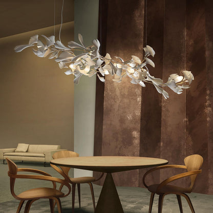 Korewolamp Gingko Ceramic Chandelier with leaf-shaped design, hanging from a chain, elegant lighting fixture.