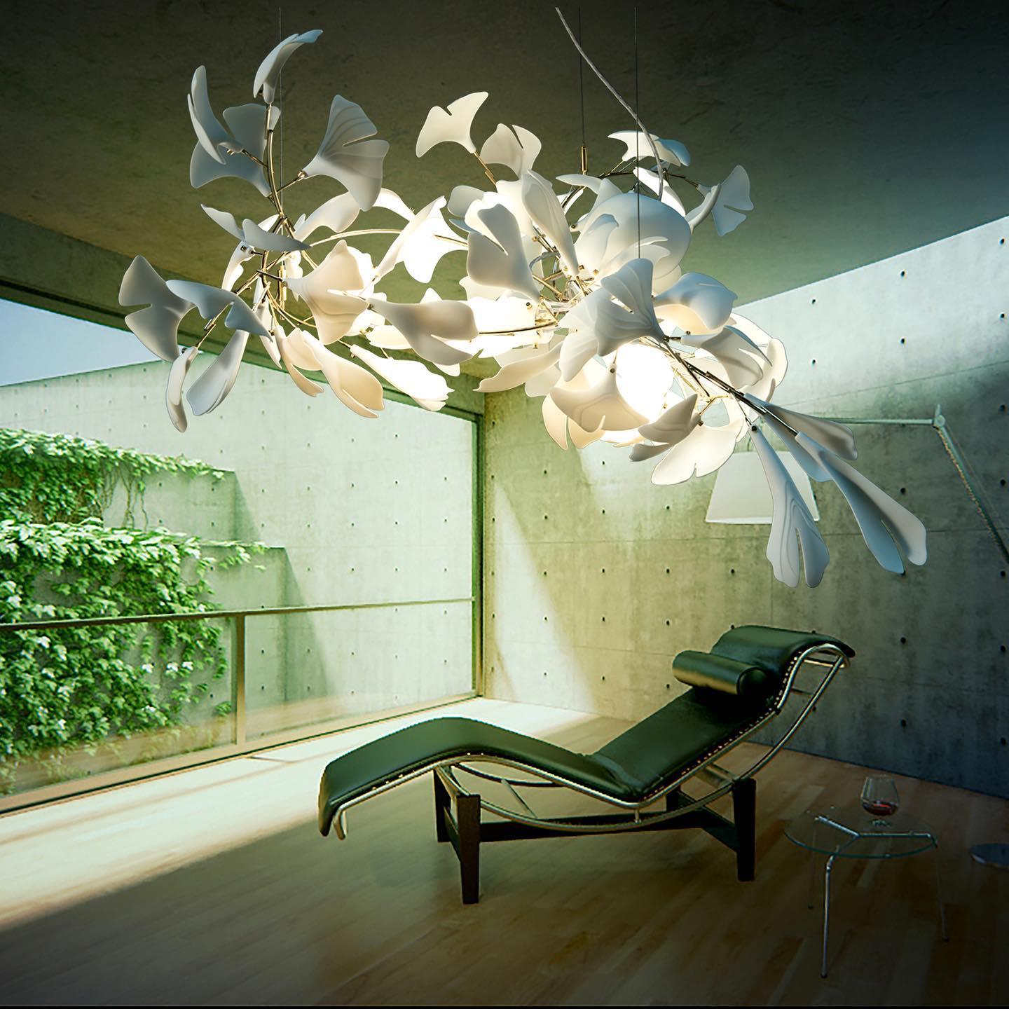 Gingko ceramic chandelier by Korewolamp featuring ginkgo leaf design and warm lighting, hanging fixture with intricate leaf pattern.