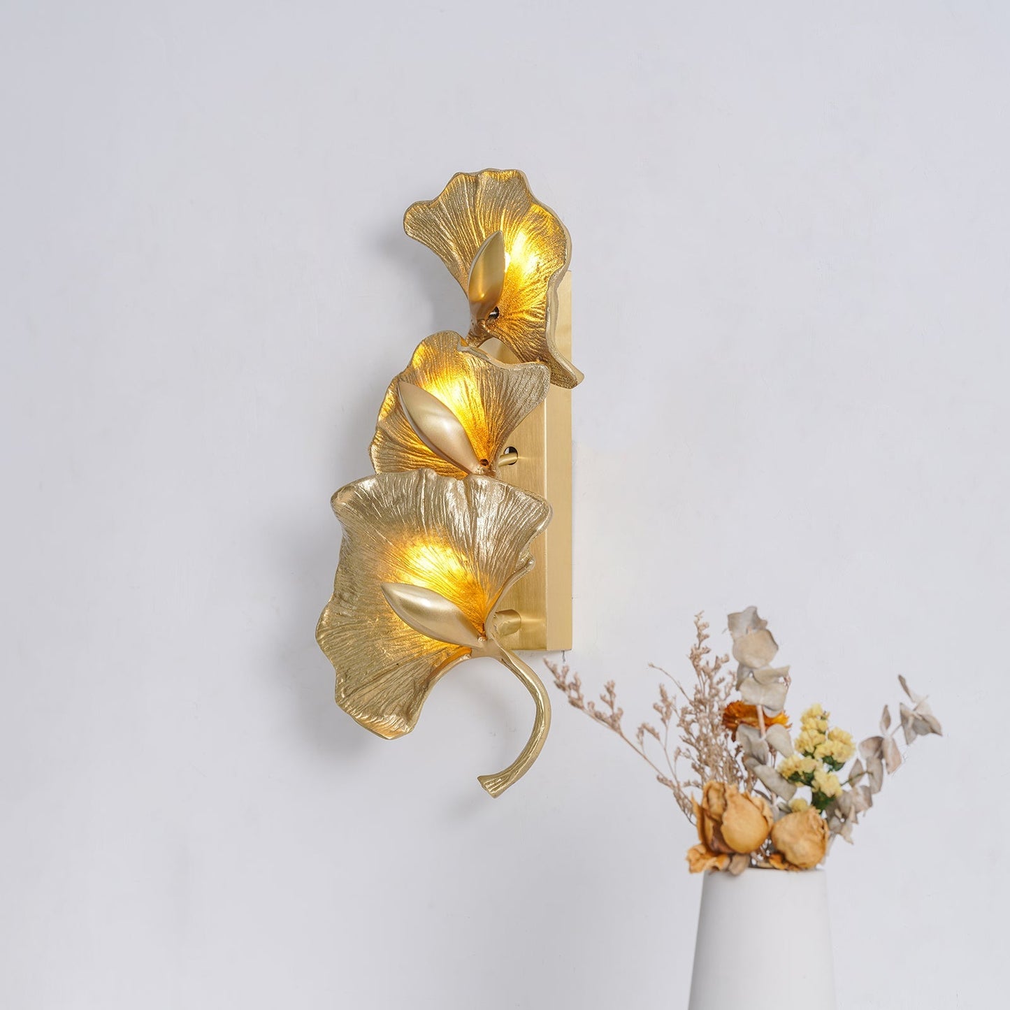 Ginkgo leaf wall lamp by Korewolamp, featuring a detailed 3D ginkgo leaf design mounted on a wall.