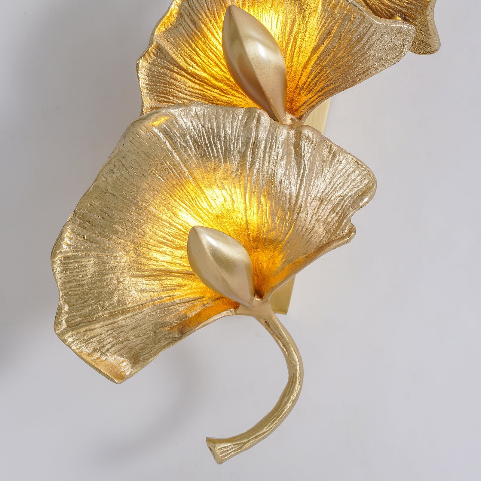 Korewolamp ginkgo leaf wall lamp with illuminated leaf design mounted on a wall, showcasing elegant natural-inspired lighting.