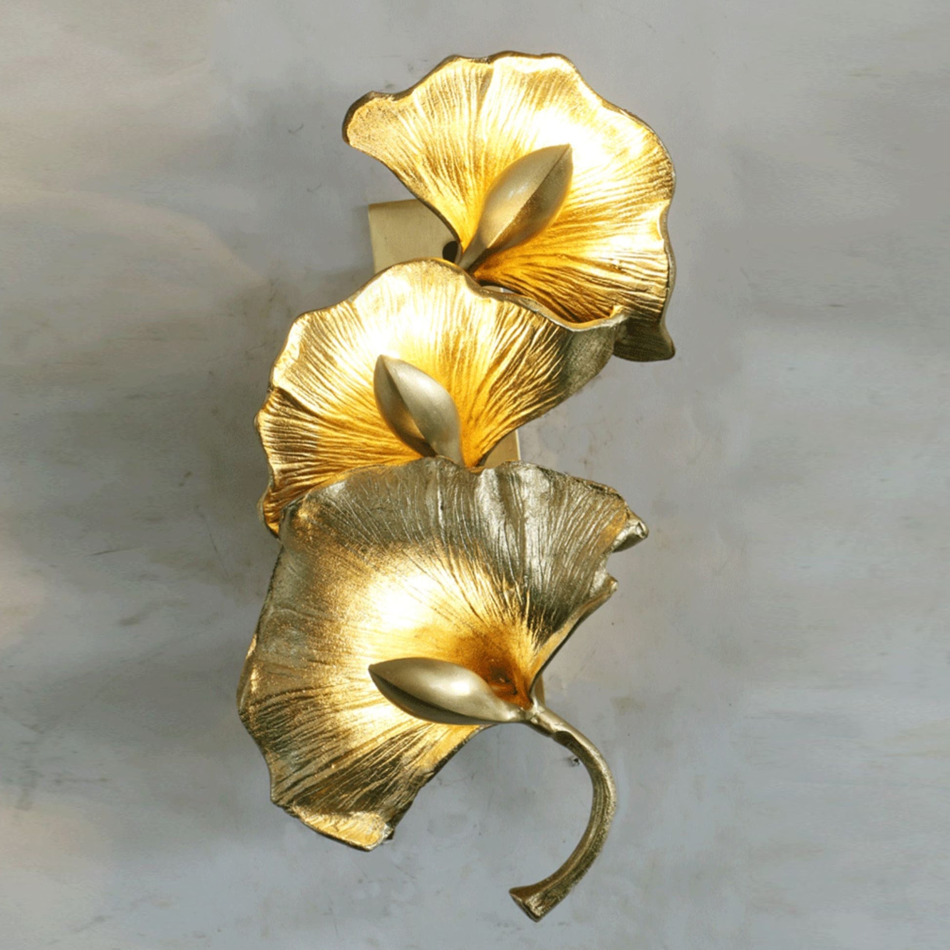 Ginkgo leaf wall lamp by Korewolamp featuring a decorative metal leaf design and soft lighting for modern interior decor.