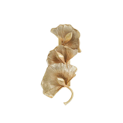 Elegant Ginkgo leaf wall lamp by korewolamp, showcasing a nature-inspired design with soft lighting and detailed leaf shape.