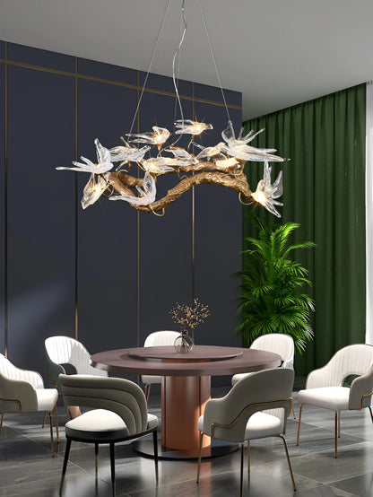 Elegant glass swallow chandelier by korewolamp featuring delicate glass bird figures hanging from a modern chandelier frame.