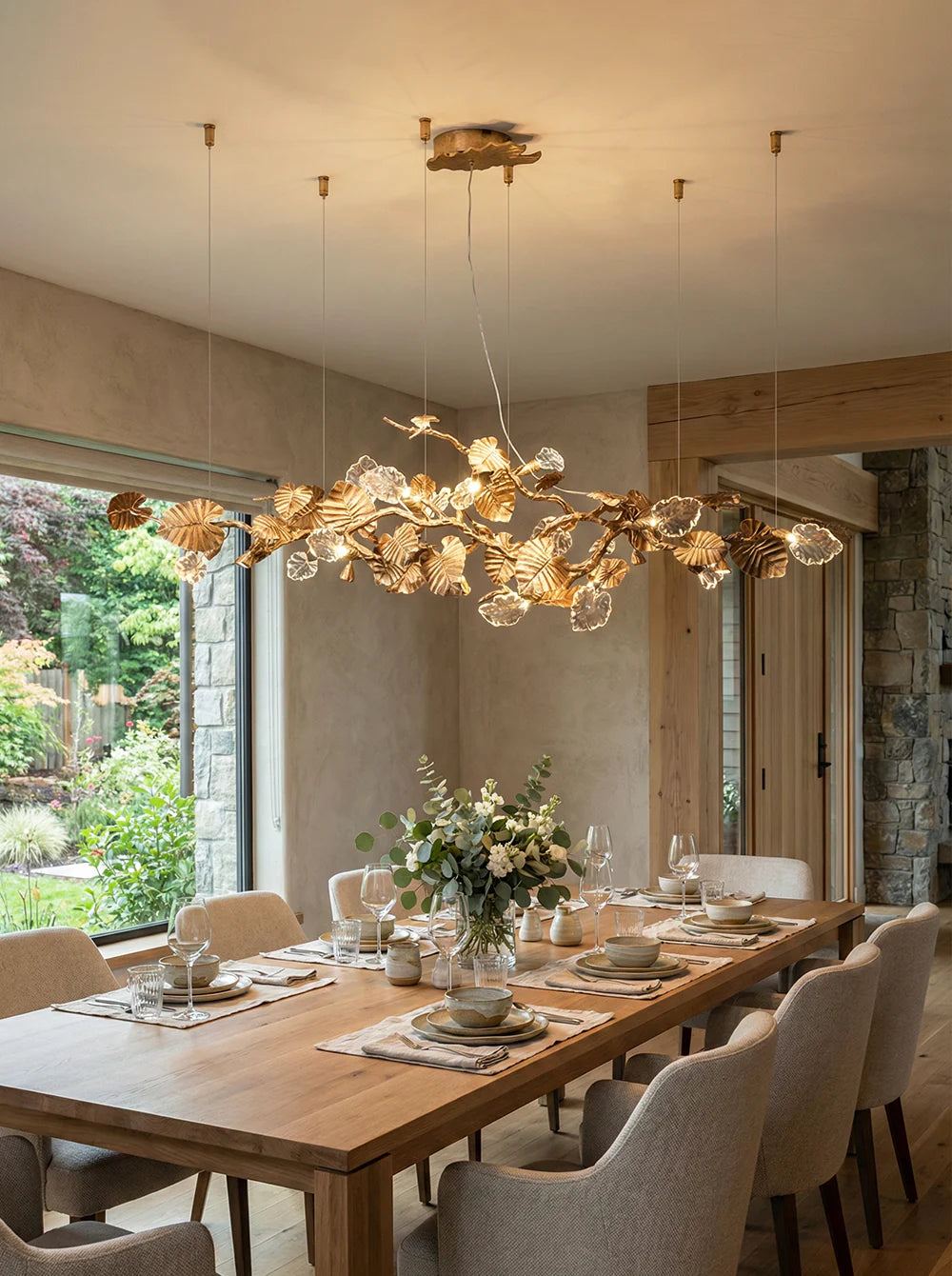 Elegant gold leaf chandelier by korewolamp featuring intricate leaf design and multiple light fixtures for sophisticated illumination.