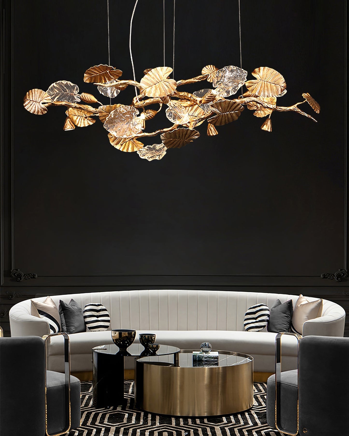 Elegant gold leaf chandelier by Korewolamp featuring intricate leaf details and multiple hanging light fixtures.