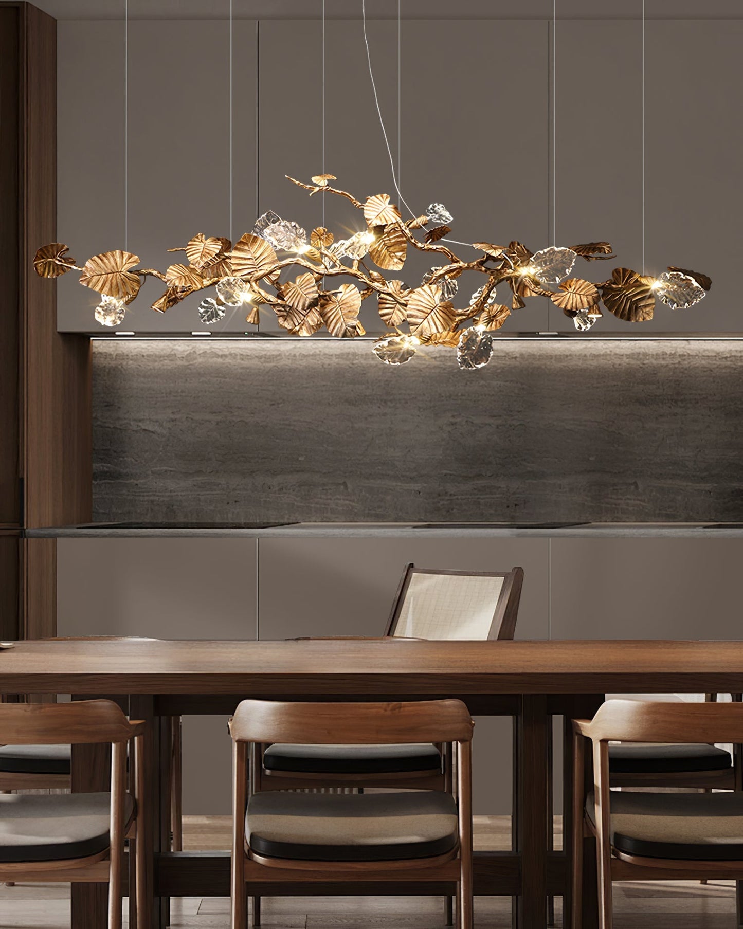 Korewolamp gold leaf chandelier with ornate detailing and multiple light fixtures hanging from a decorative frame.