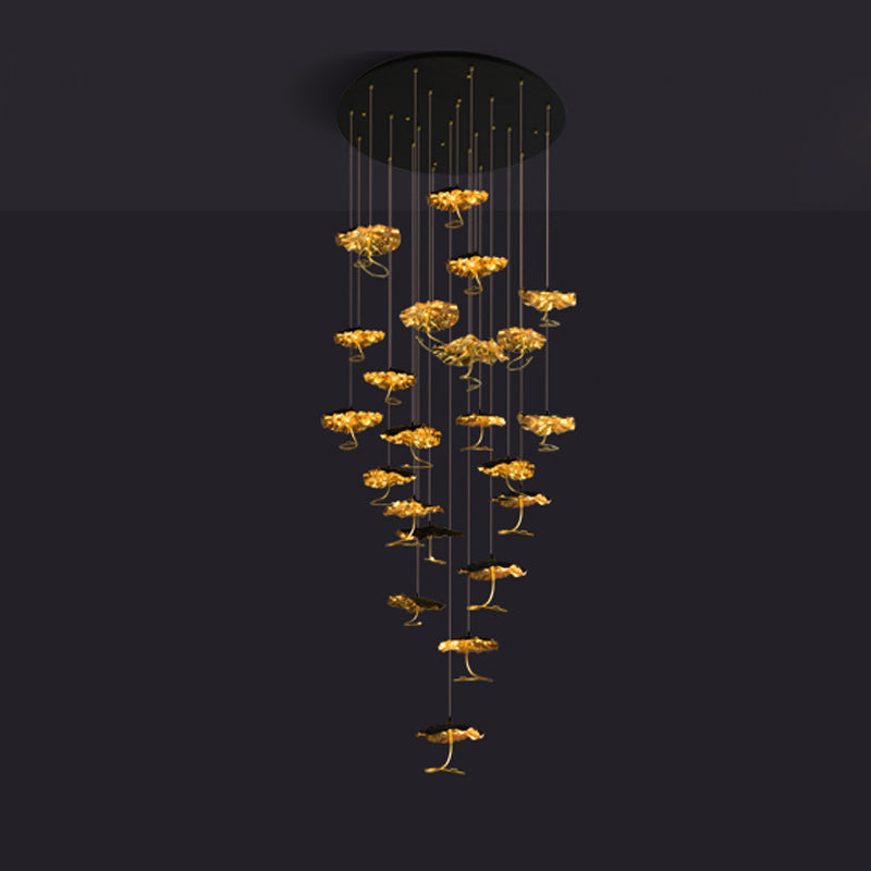 Gold brass aviary constellation chandelier with moon-shaped design featuring star-shaped accents, hanging from a sleek chain.