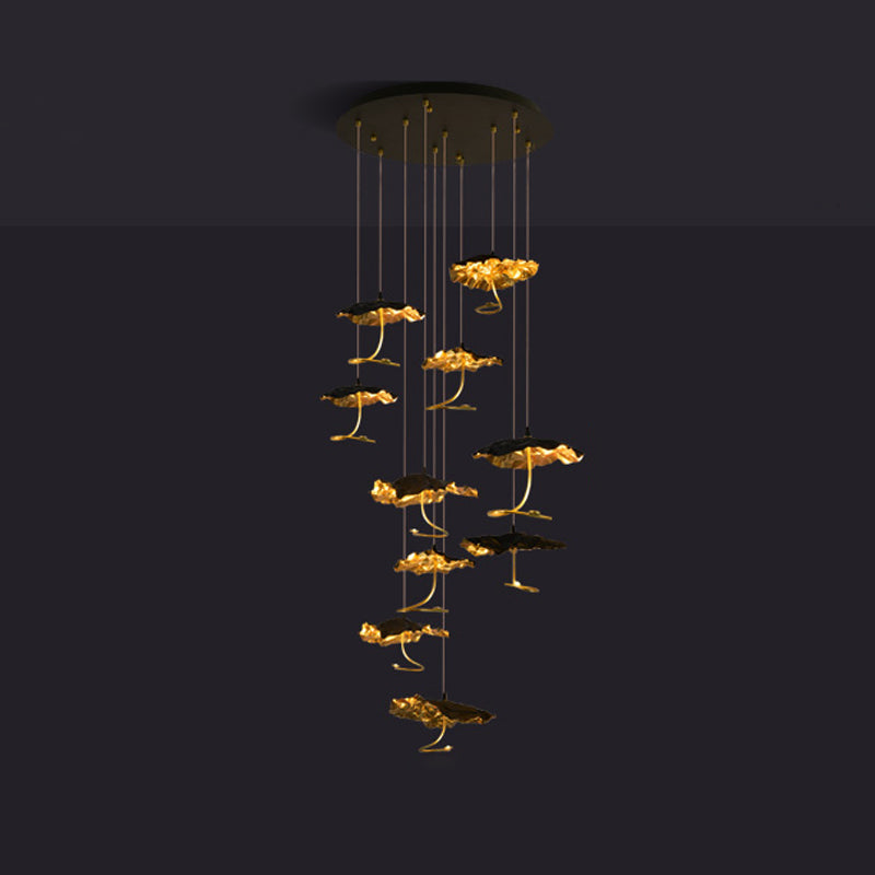 Gold brass aviary constellation chandelier with moon design, showcasing intricate star and bird details for elegant lighting.