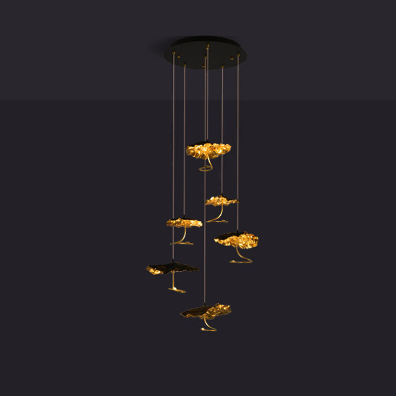 Gold brass aviary constellation chandelier with moon design by korewolamp, featuring intricate star and moon-shaped details.