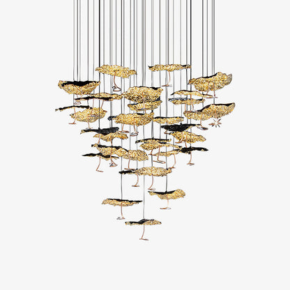 Gold brass aviary constellation chandelier with moon design by korewolamp, featuring intricate star and celestial shapes.