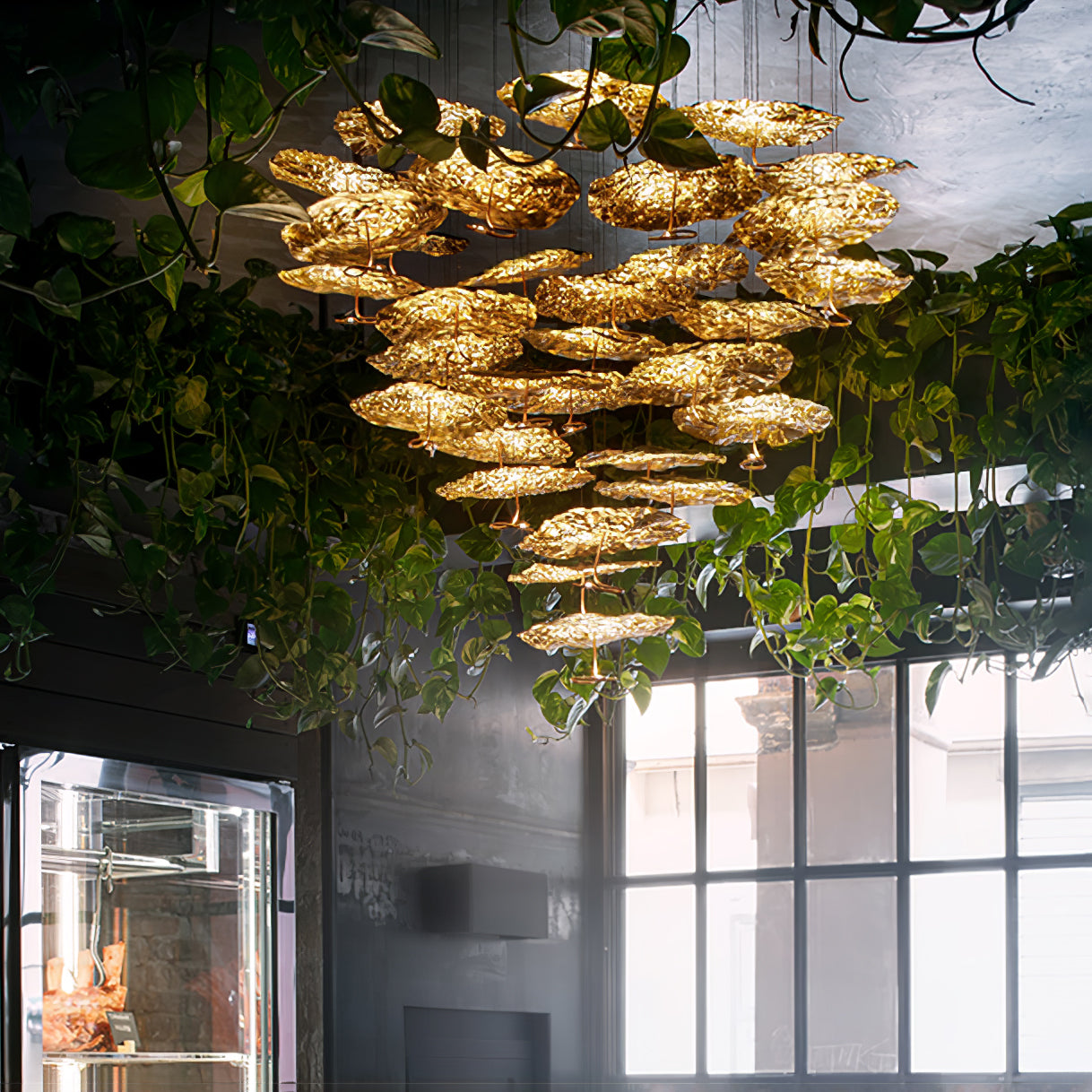 Gold brass aviary constellation chandelier with moon design featuring hanging star accents, by korewolamp.