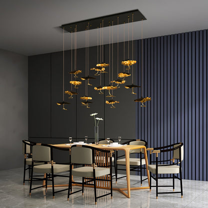Gold brass aviary constellation chandelier with moon design, featuring intricate bird and star details by korewolamp.