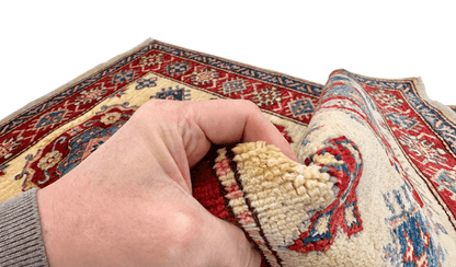 Kirishian Rugs Super Kazak 3'01" x 5'00" ivory and red area rug with intricate traditional patterns, woven from high-quality materials.