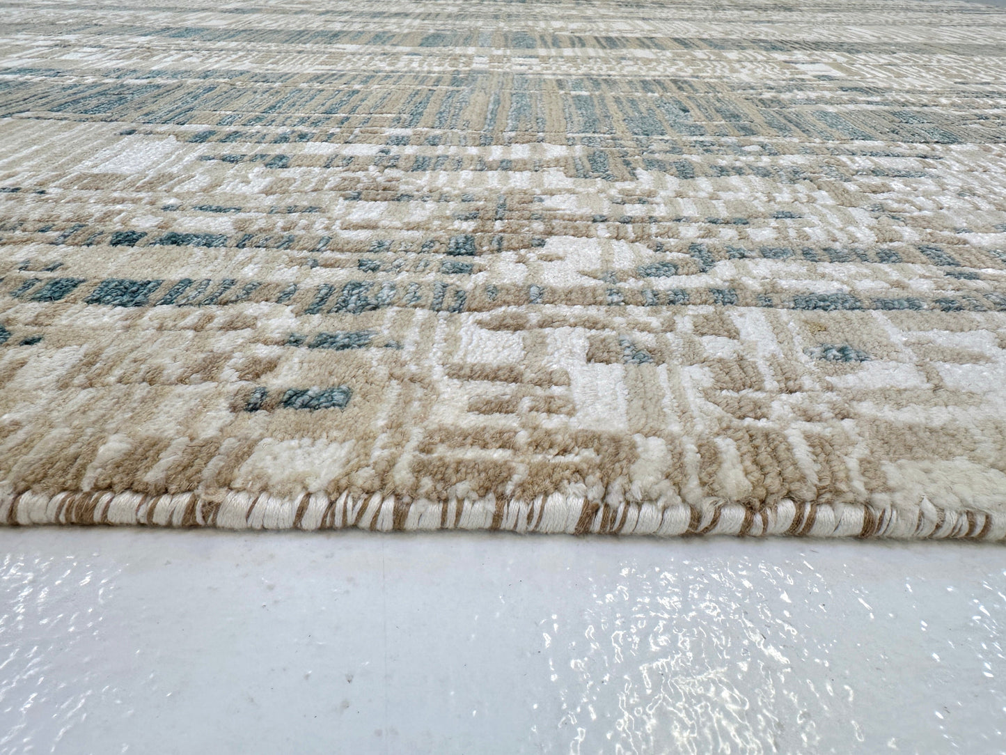 Kirishian Rugs OneKind contemporary wool and bamboo area rug in gold, ivory, and teal with geometric patterns, 8x10 feet size.