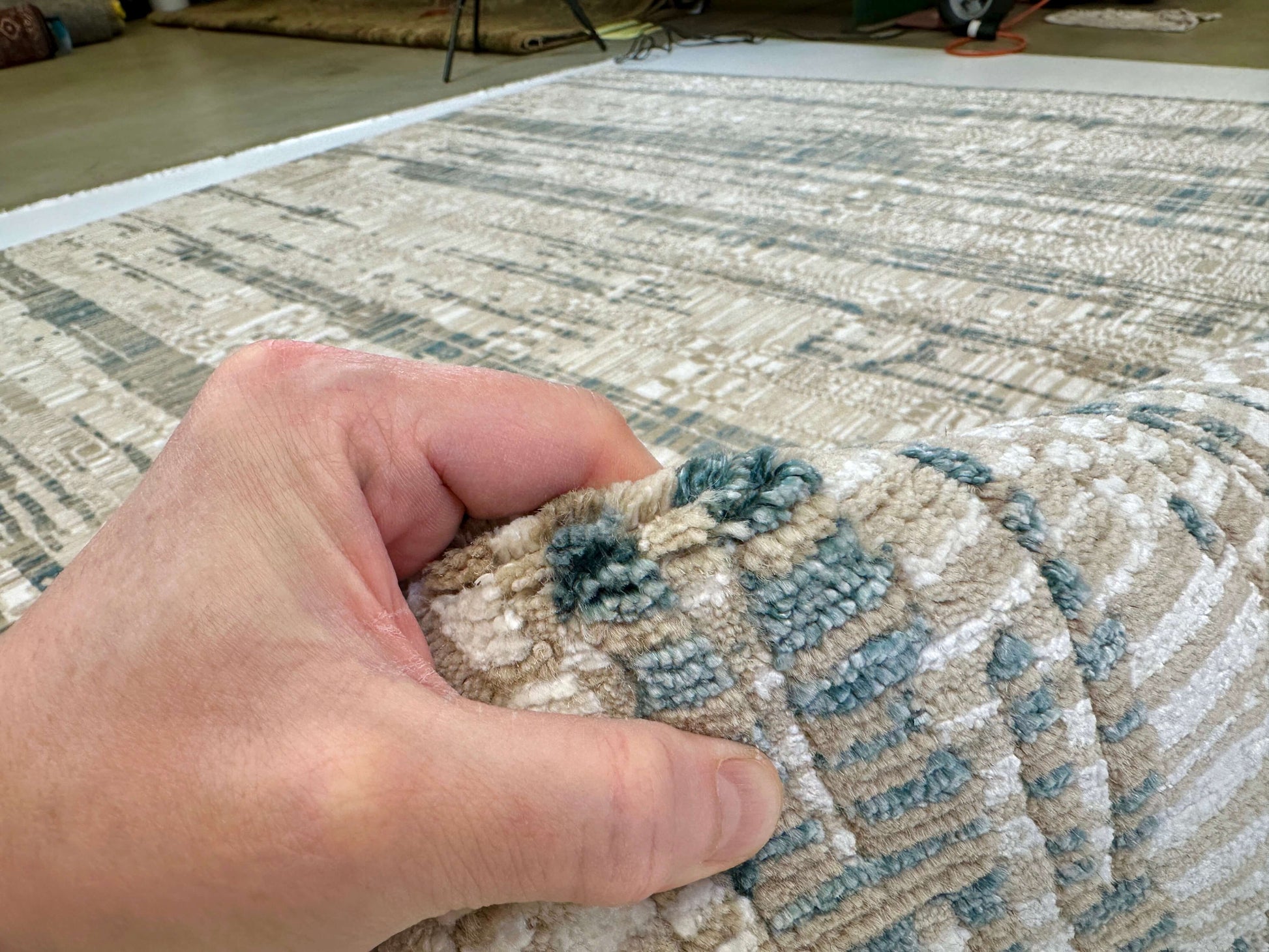 Contemporary Kirishian Rugs OneKind wool and bamboo rug in gold, ivory, and teal with 8x10 feet size, featuring a modern design.