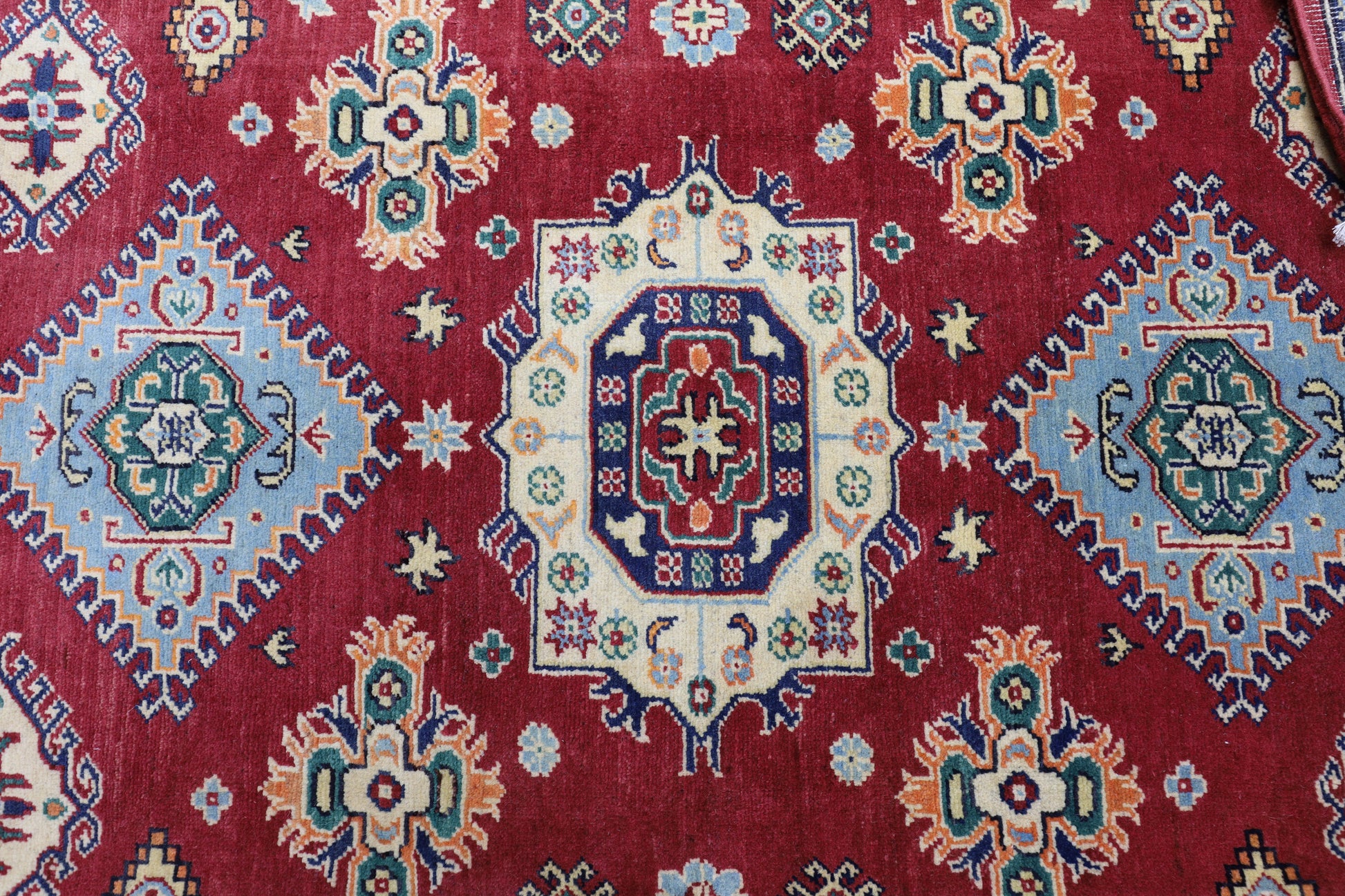 Hand-Knotted Afghani Kazak Wool Rug – 4’10″  x  6’6″ - Nuvé