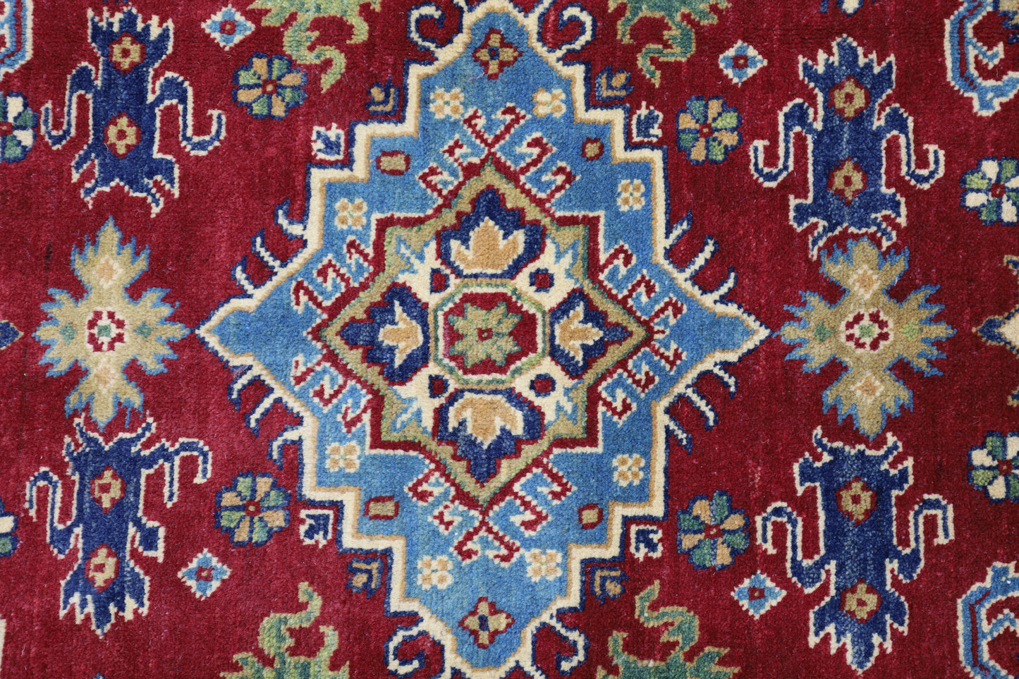 Hand-Knotted Afghani Kazak Wool Rug – 4’9″  x  6’8″ - Nuvé