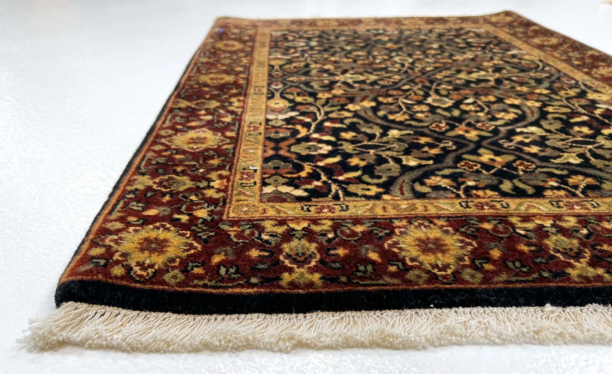 Kirishian Rugs IndoFarahan black and rust 2x3 inch OneKind decorative rug with intricate pattern on neutral background.